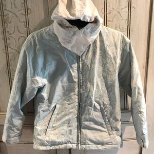 Marker snow jacket with foldable hood.